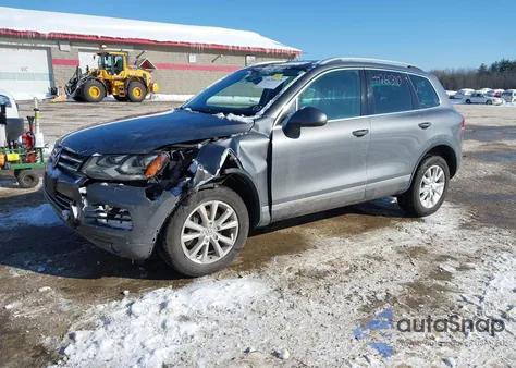 2014 Volkswagen Touareg 3.6L Sport z USA, uszkodzony, nr VIN WVGEF9BP3ED012285